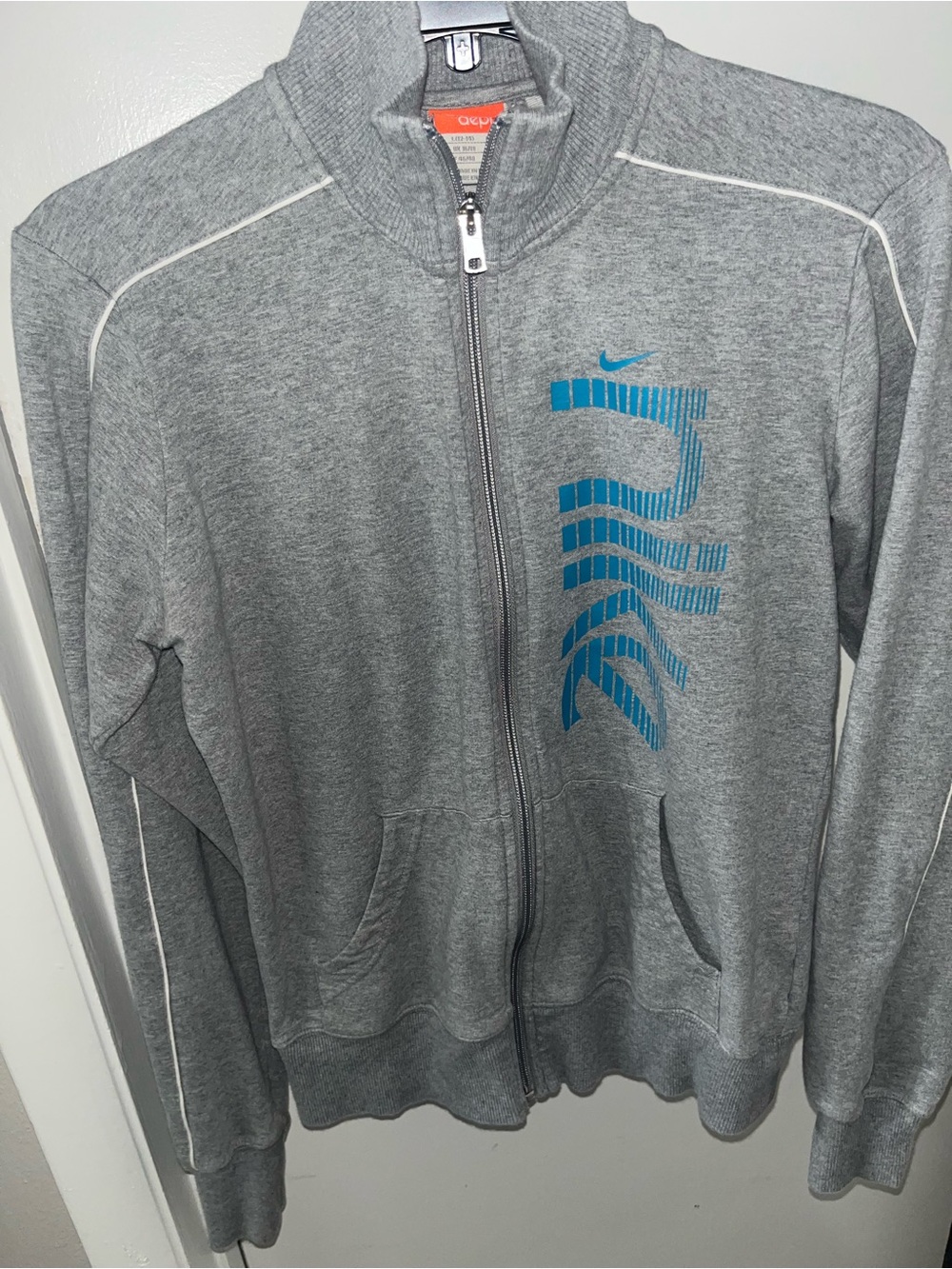 Nike Women’s Gray Full-Zip Sweater with Blue Logo Graphic